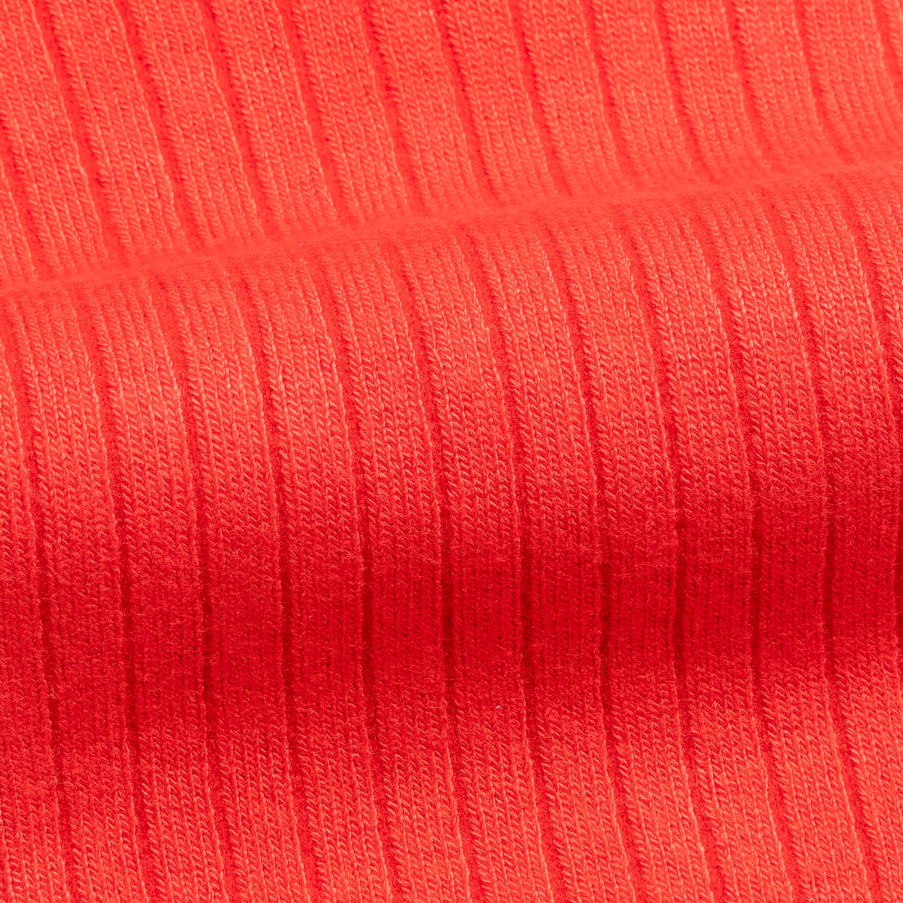 Bamboo dress socks in bright orange rib knit fabric close-up