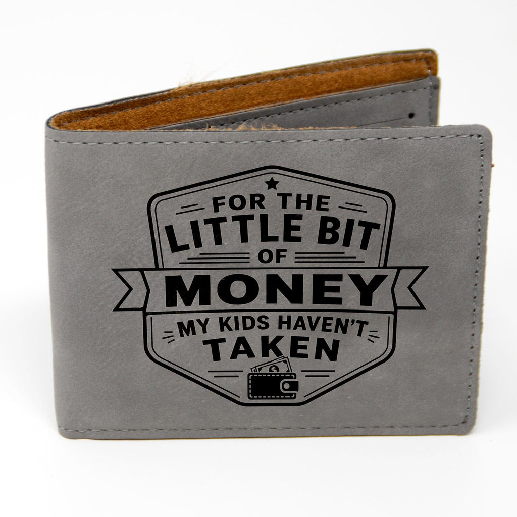 Gray leather bifold wallet with engraved “FOR THE LITTLE BIT OF MONEY” badge