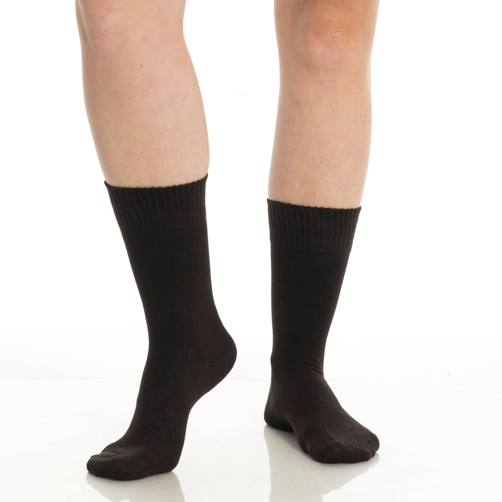 Black diabetic crew socks on two legs, crew length and ribbed cuffs