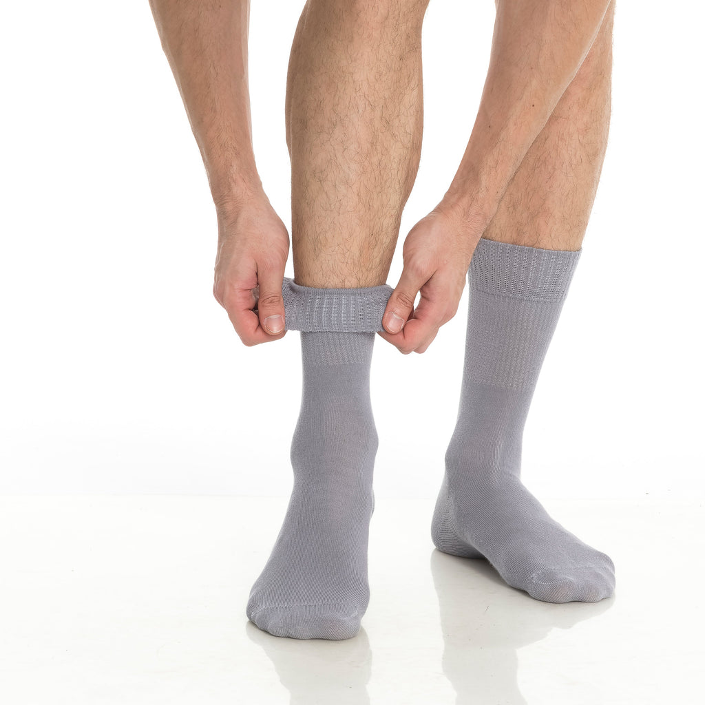 Light gray crew socks on model, ribbed mid-calf cuffs