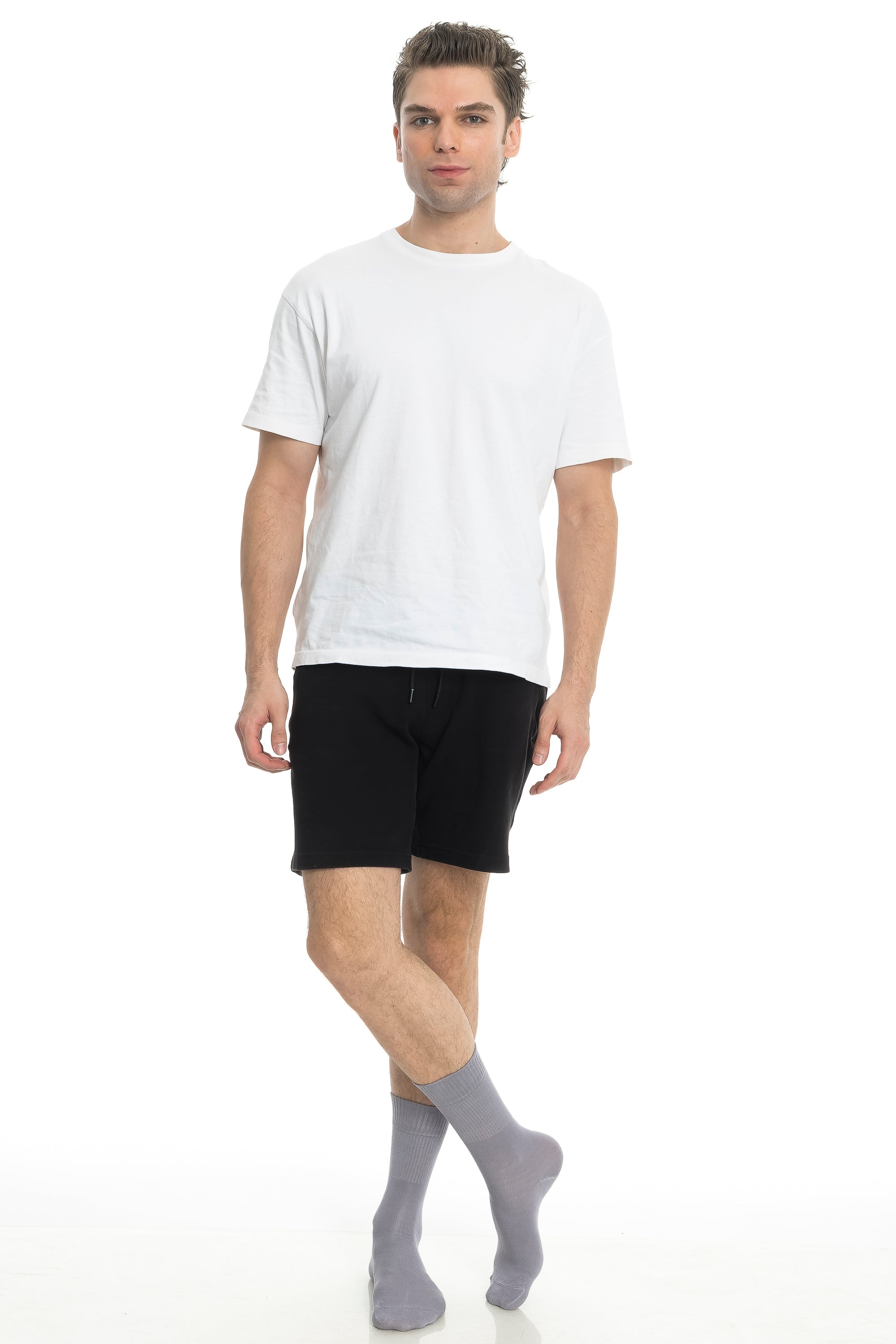 Gray bamboo diabetic crew socks on legs, mid-calf with ribbed cuffs.