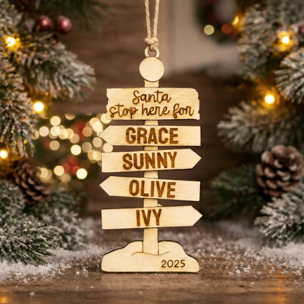 Rustic wooden family Christmas signpost ornament with engraved Santa, four names, and 2025