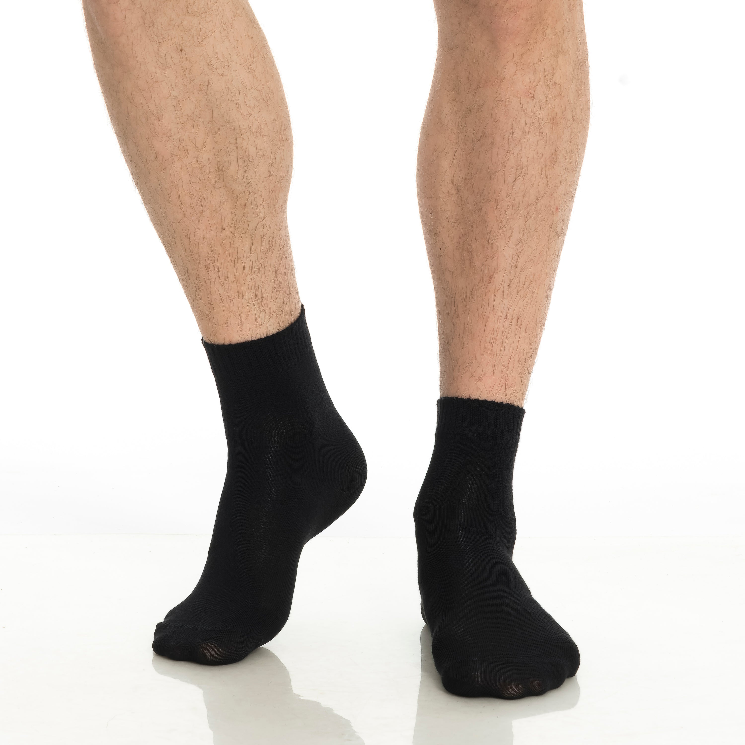 Black bamboo diabetic ankle socks worn on legs, ankle-length crew socks.