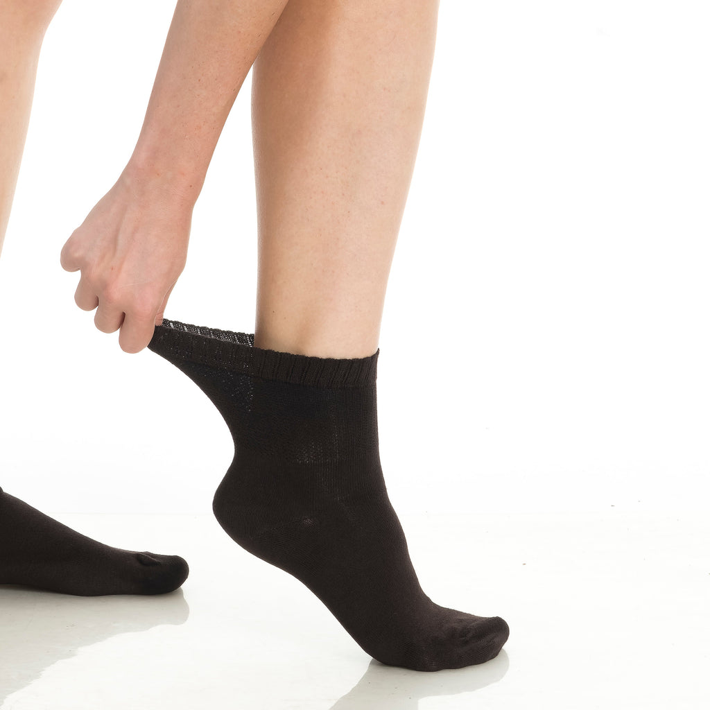 Bamboo diabetic ankle socks 4-pack, dark sock on foot with heel and toe coverage