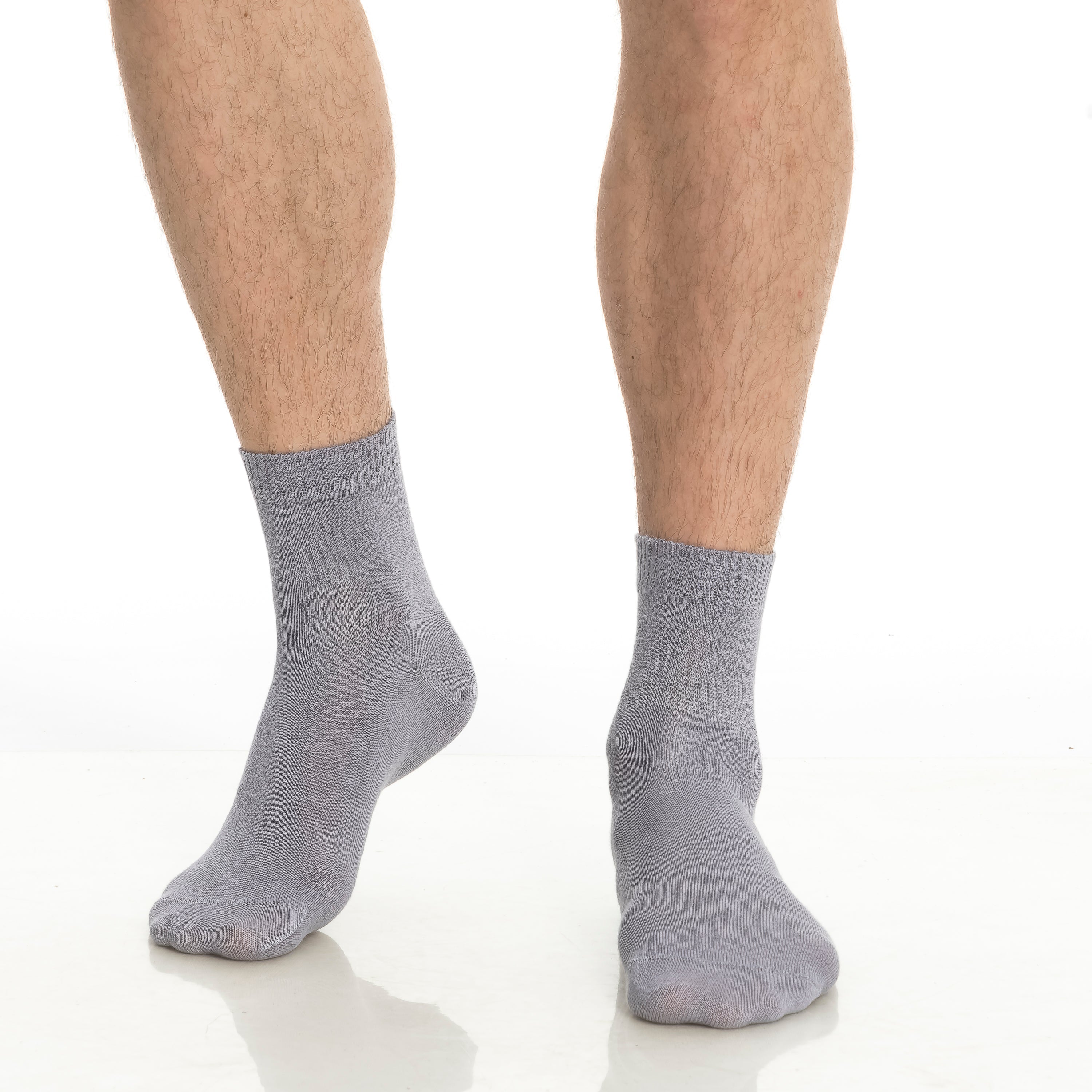 Gray bamboo diabetic ankle socks, two pairs worn, crew cuff.