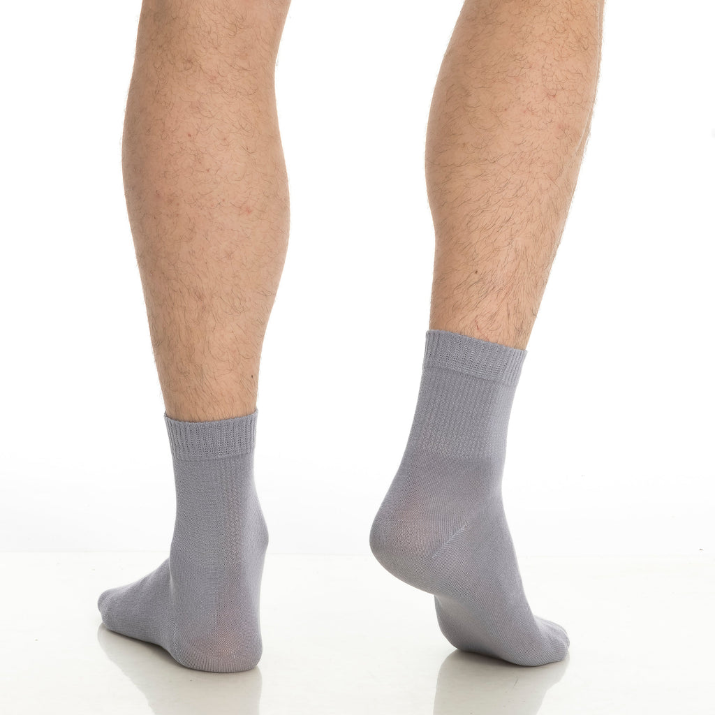 Gray bamboo diabetic ankle socks on legs, ankle-length crew style.