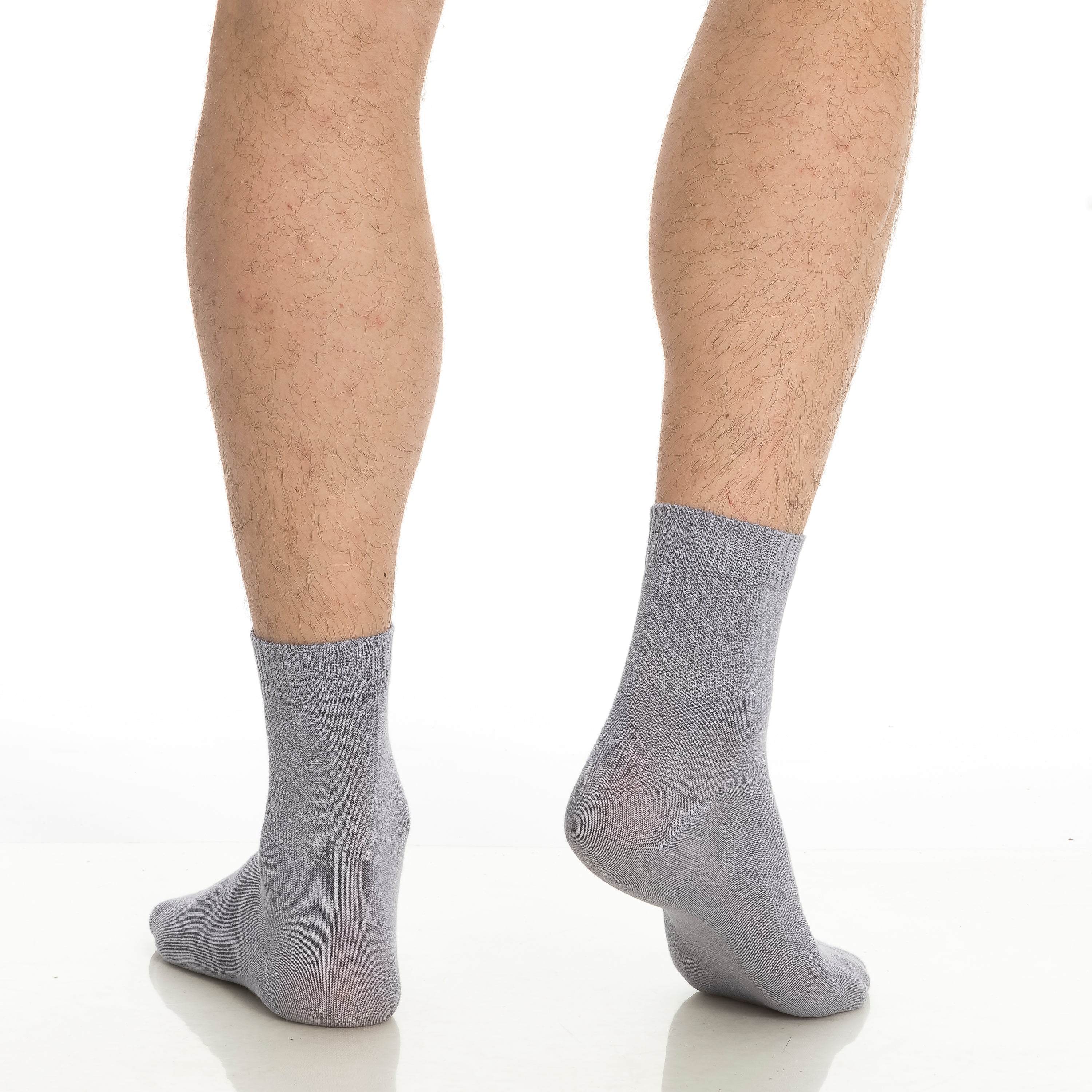 Gray bamboo diabetic ankle socks on legs, ankle-length crew style.