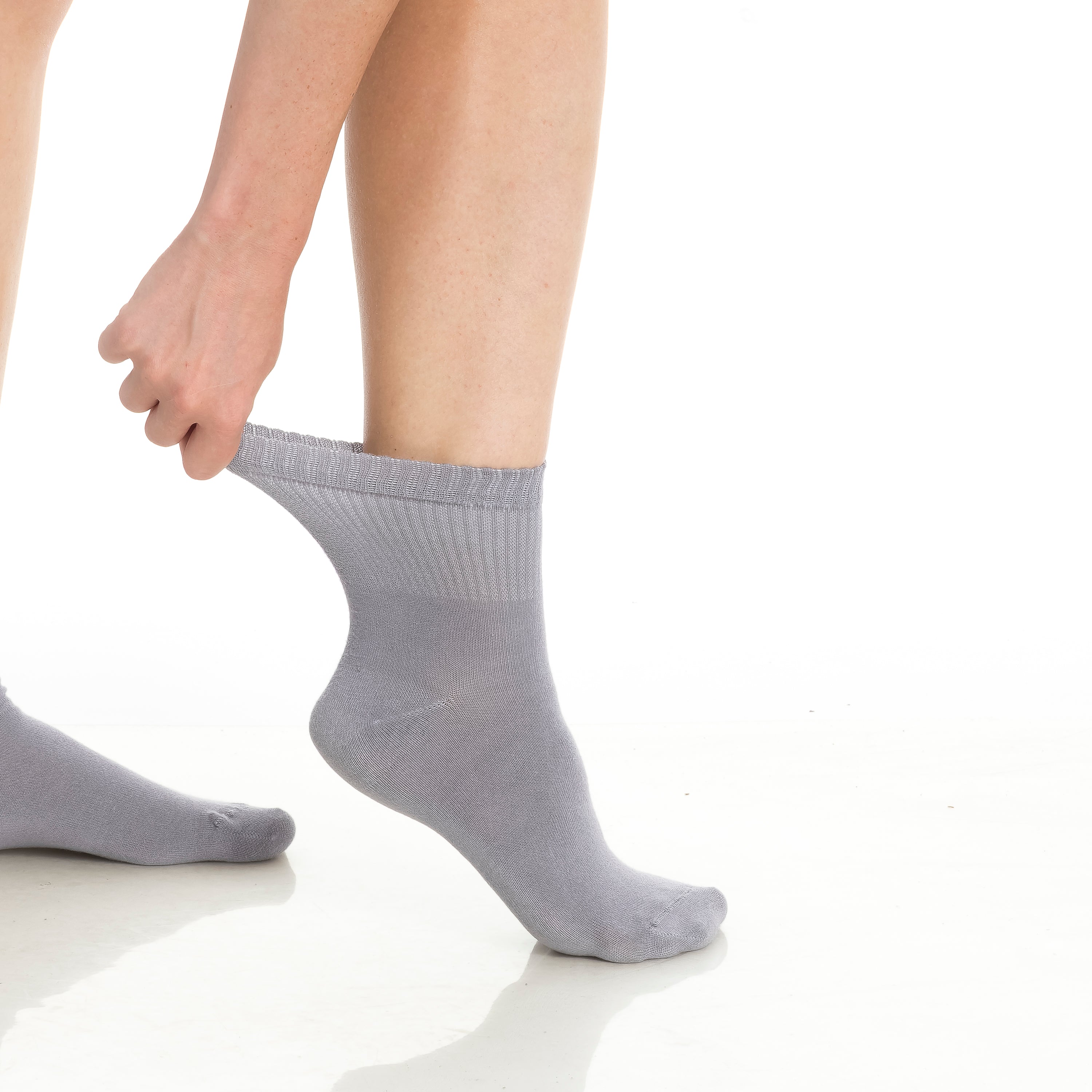Gray bamboo diabetic ankle sock on foot, low-cut ankle height