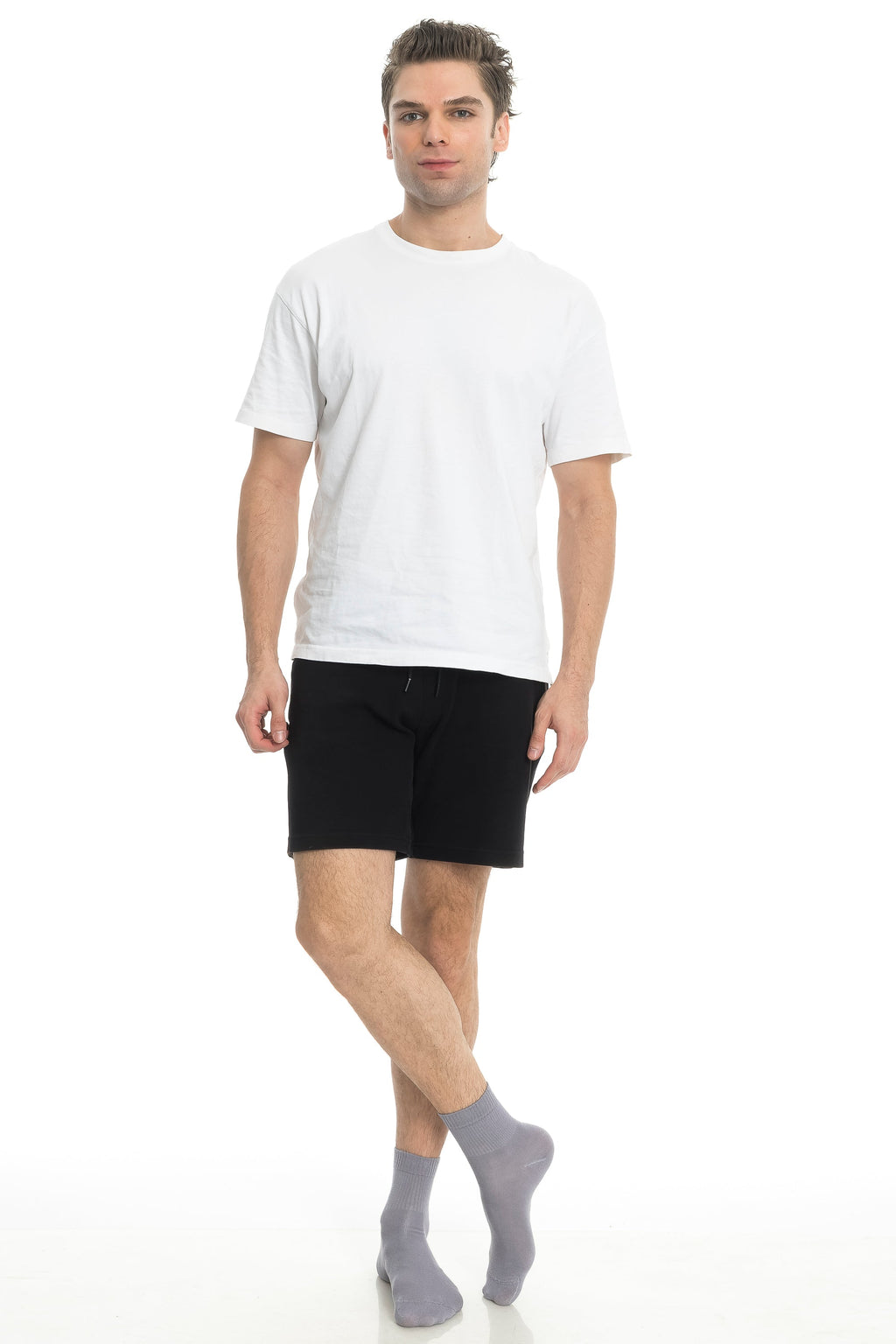 Bamboo diabetic ankle socks on man, light gray crew socks with black shorts.