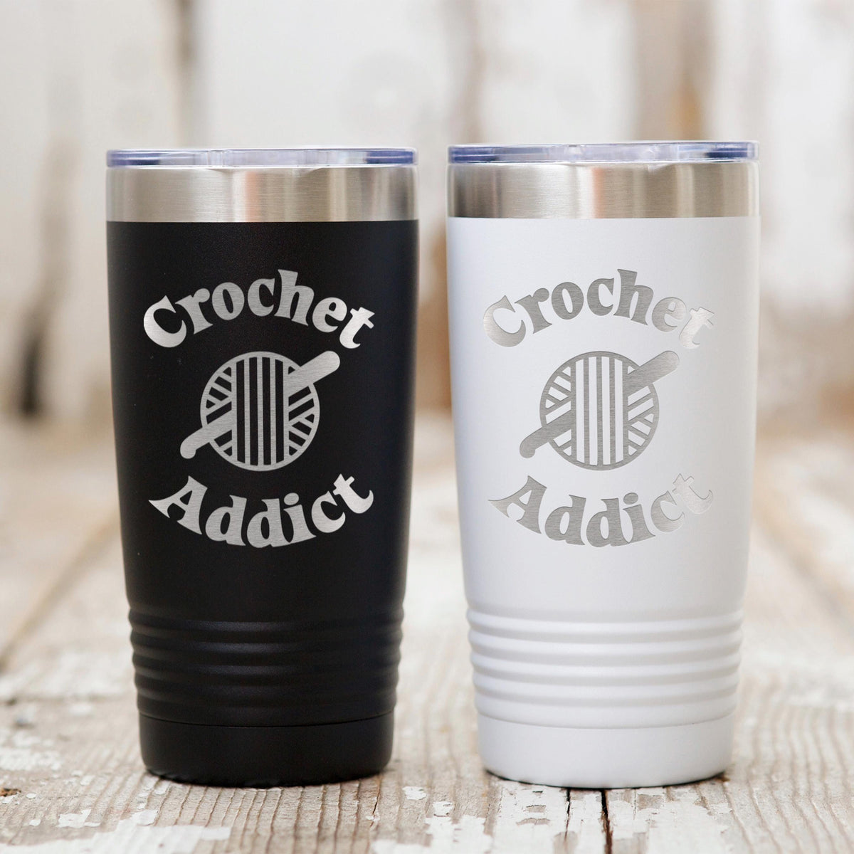 20 oz insulated travel tumbler pair: black and white with Crochet Addict logos and metal lids