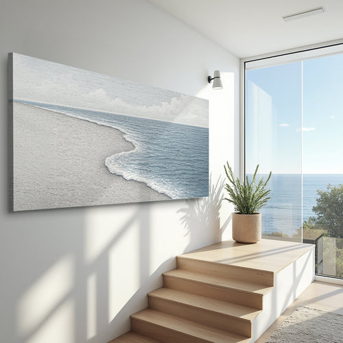 Landscape canvas wall art showing a beach shoreline with foamy waves and blue sea