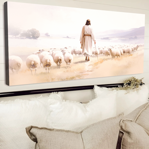Landscape canvas wall art with a woman in white walking on a path near sheep