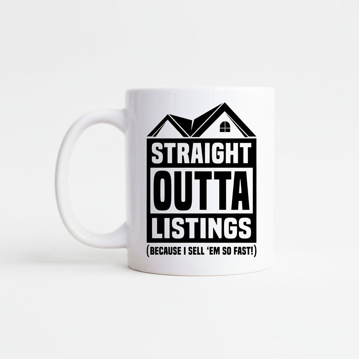 White ceramic mug with black “STRAIGHT OUTTA LISTINGS” house graphic