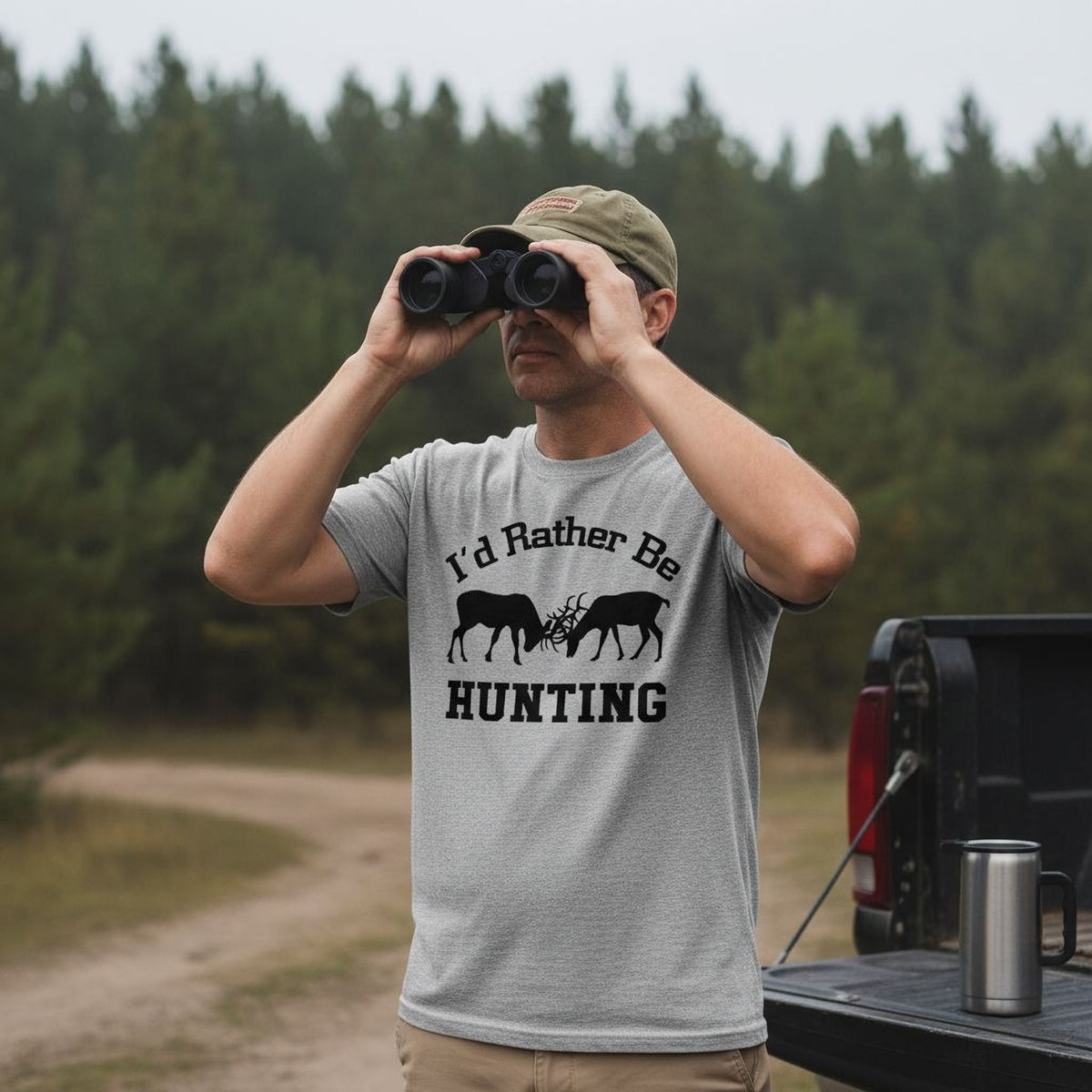 Gray unisex T-shirt worn outdoors, featuring black hunting graphic on the chest
