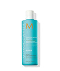 Moisture Repair Shampoo bottle, teal with white cap and front label