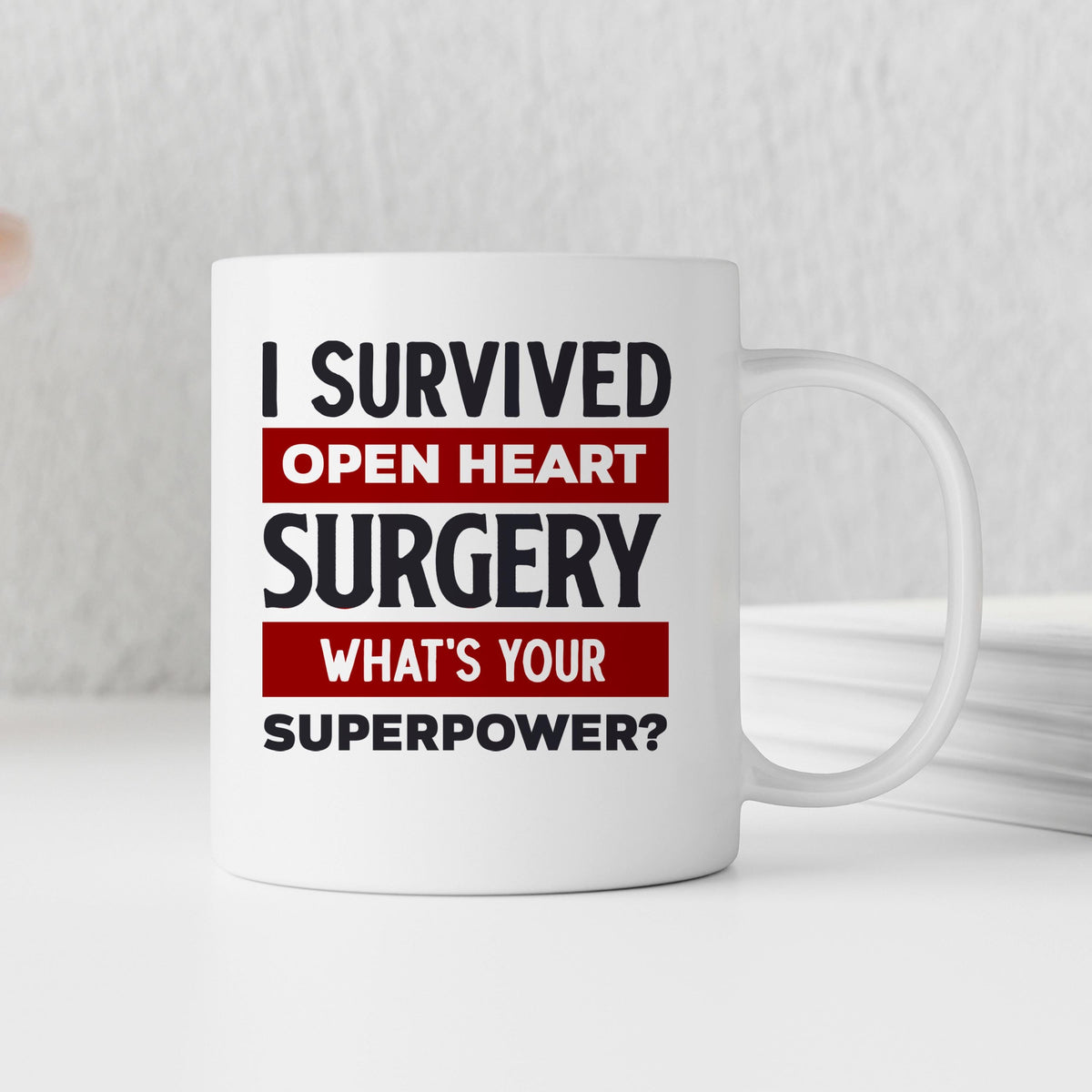 White coffee mug with slogan: I Survived Open Heart Surgery, What’s Your Superpower?