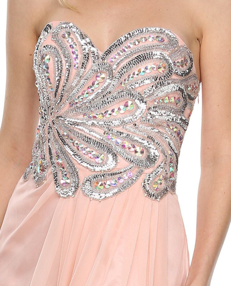 Close-up of ornate beaded sweetheart bodice on blush tulle gown