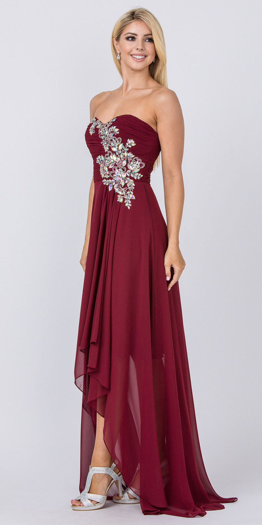 Burgundy strapless prom dress with jeweled bodice and flowing high-low skirt