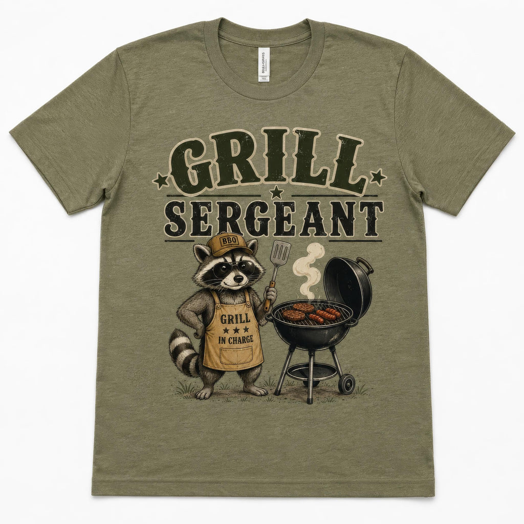 Olive unisex T-shirt with “GRILL SERGEANT” raccoon holding grill graphic