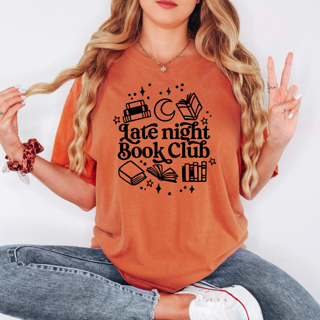 Orange crewneck tee with 'Late night Book Club' book, moon, and city graphic