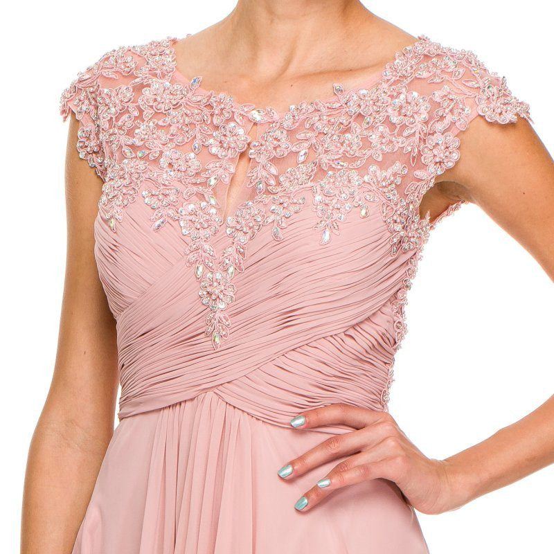 Dusty rose A-line gown close-up: beaded lace cap sleeves and draped empire waist