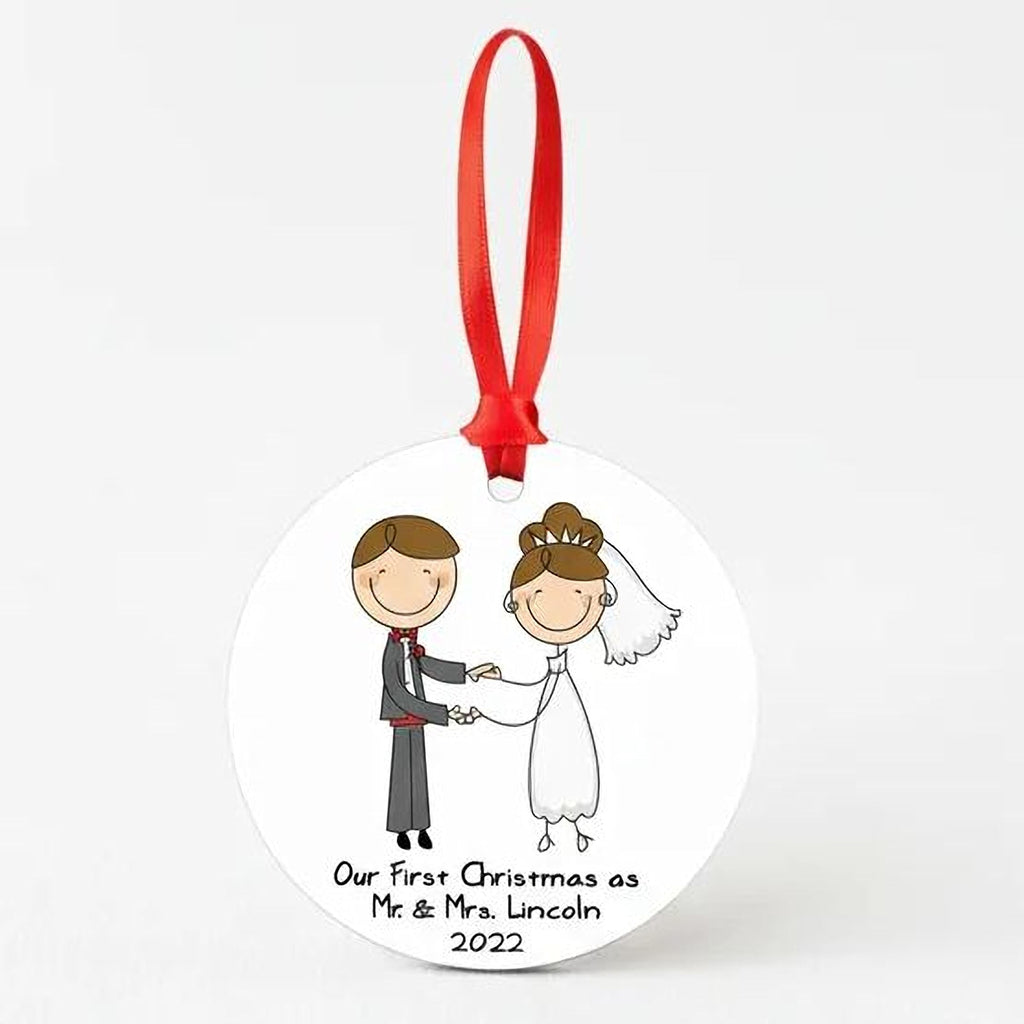 White round wedding ornament with red hanging ribbon, illustrated bride and groom and '2022' text