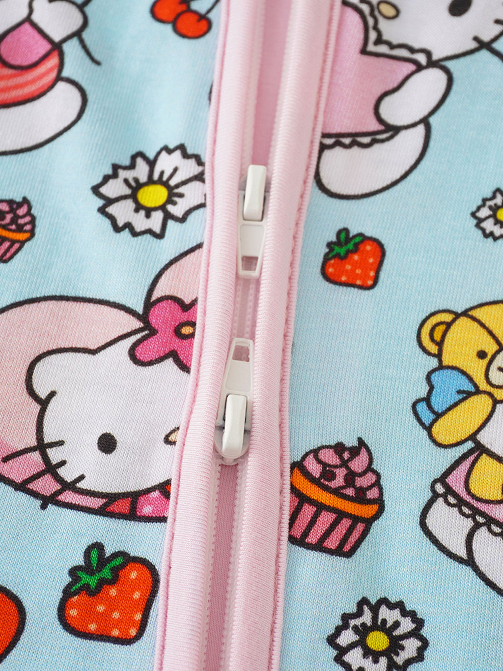 Bamboo baby romper zipper detail with pink pull and Hello Kitty friends print