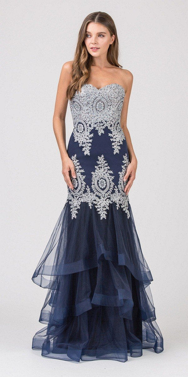 Navy strapless embroidered gown with layered tulle skirt and ornate lace motifs