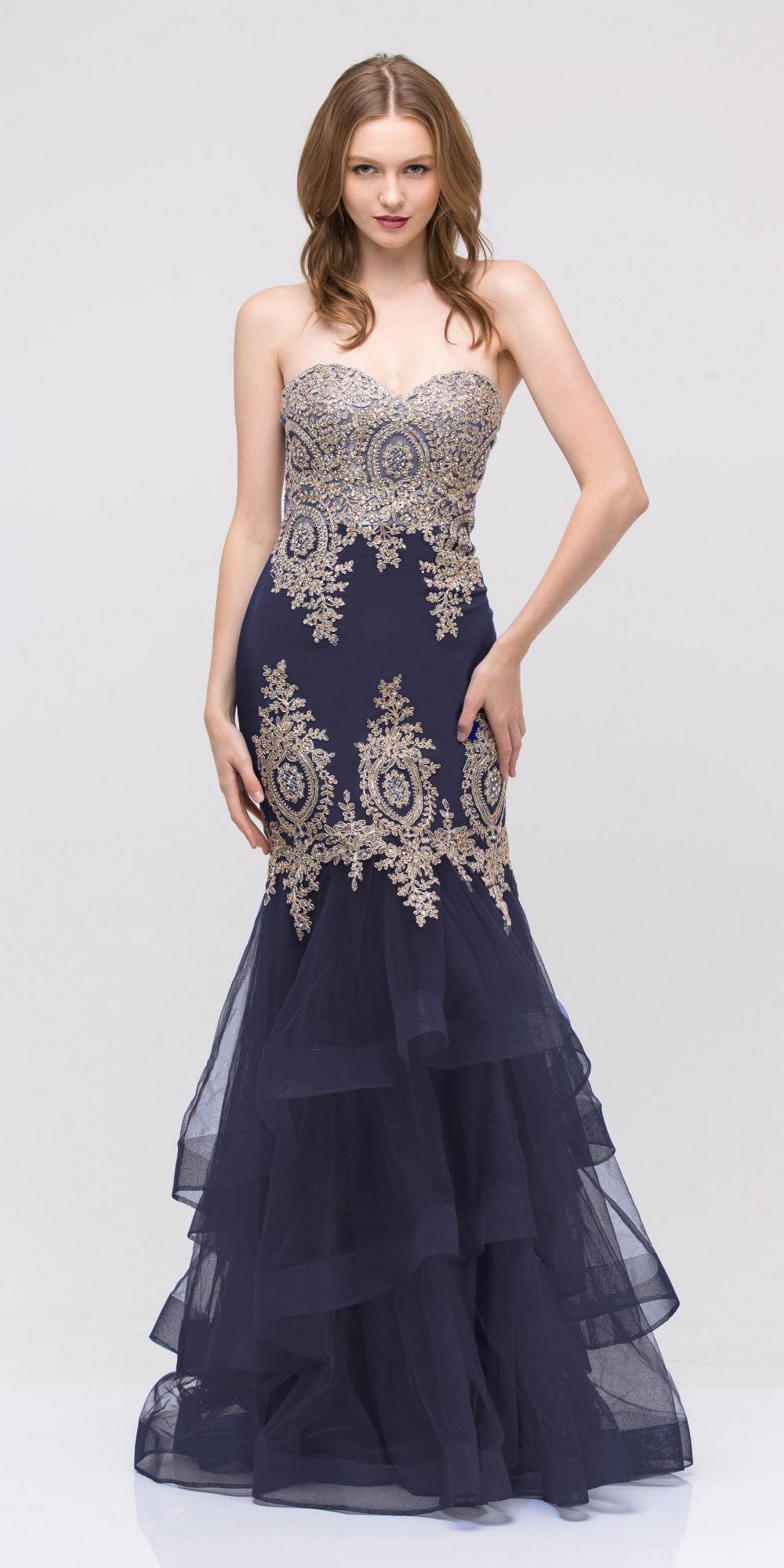Navy strapless embroidered gown with layered tulle skirt and gold ornamental designs