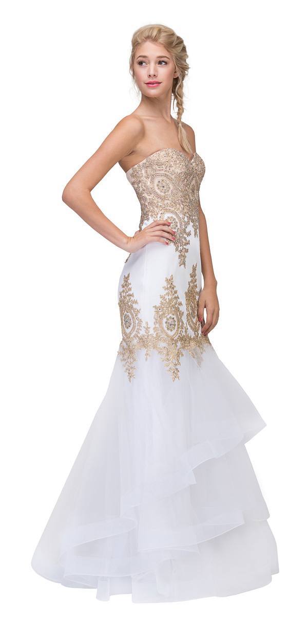 Ivory strapless embroidered gown with layered tulle skirt and lace-like bodice details