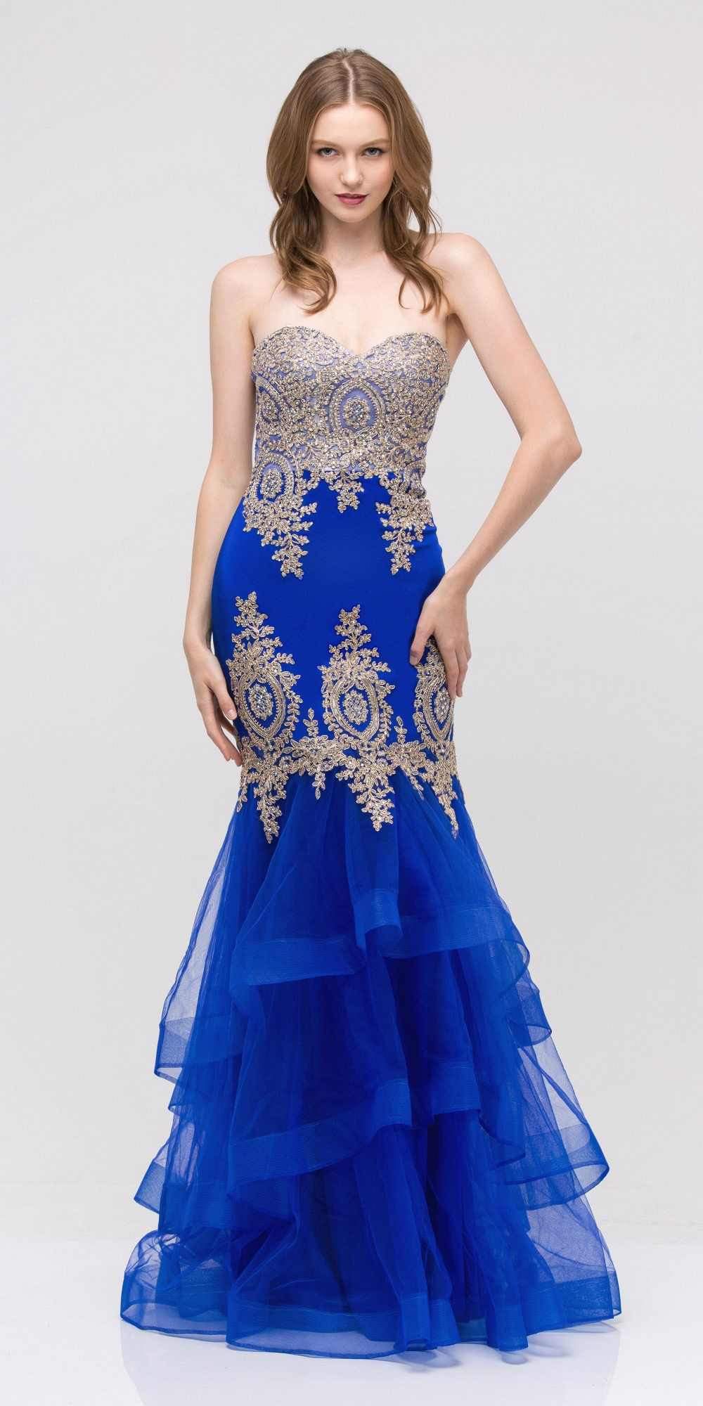 Blue strapless embroidered gown with layered tulle skirt and ornate gold motifs