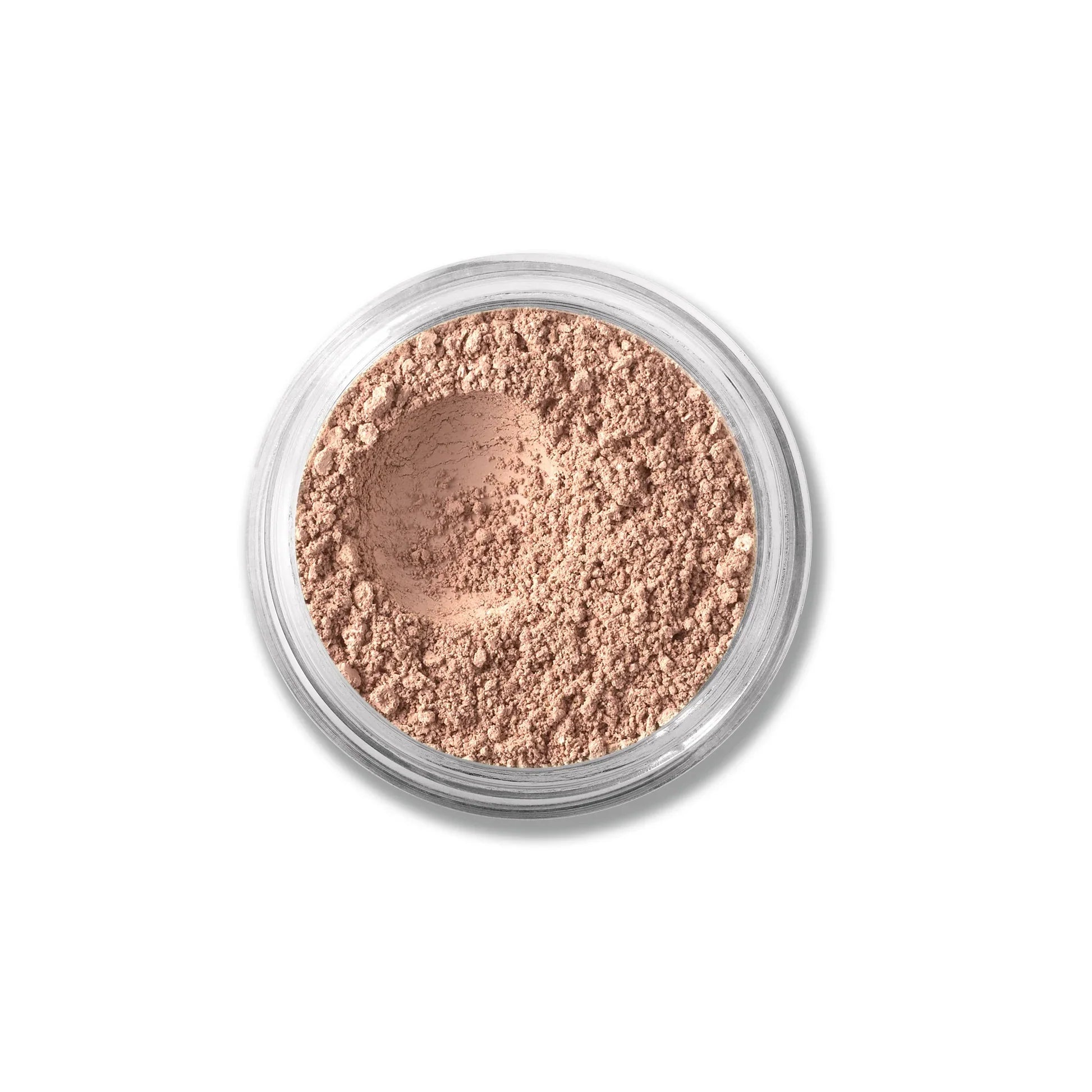 Loose concealer powder in clear jar, medium warm beige-brown