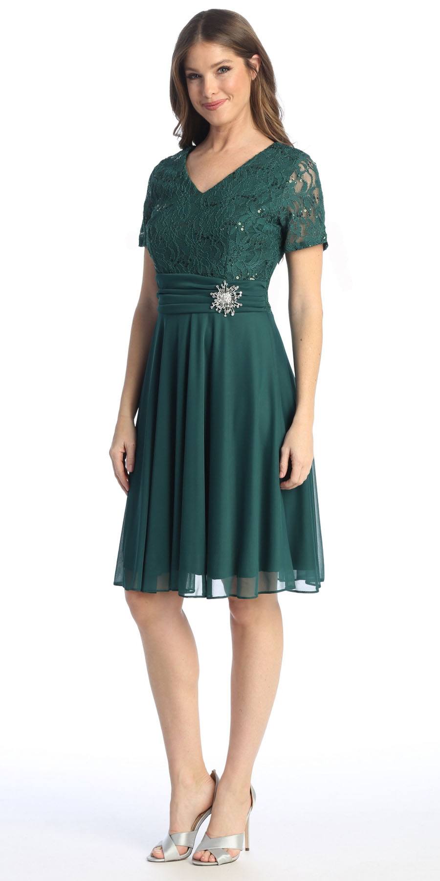 Teal knee-length dress with short sleeves and beaded waist detail