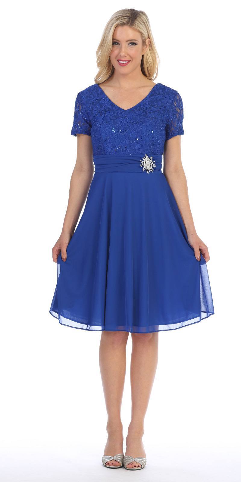 Blue knee-length dress with short sleeves, V-neck, and beaded waist detail