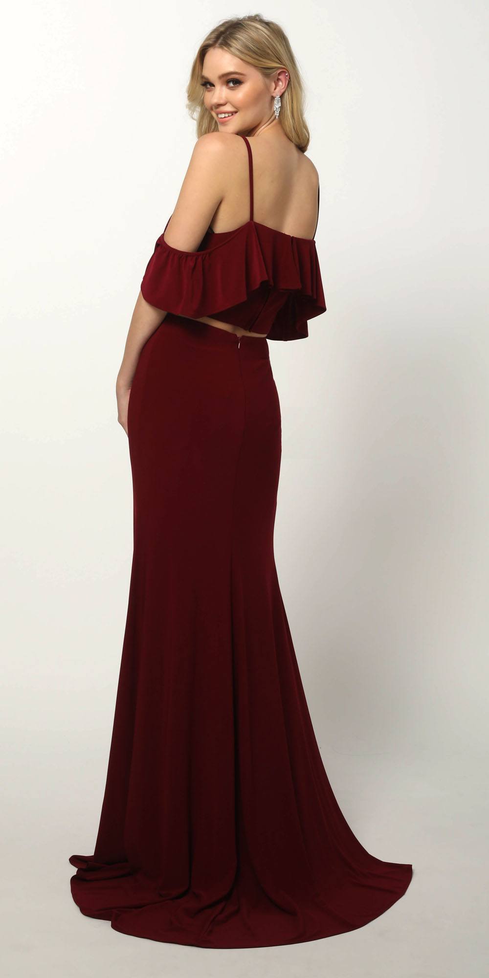 Burgundy cold-shoulder two-piece gown with sleeveless ruffle crop top and long slit skirt