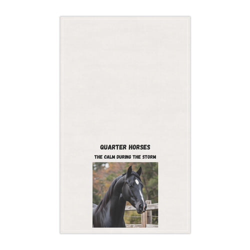 White vertical kitchen towel with centered black horse photo and storm calm text