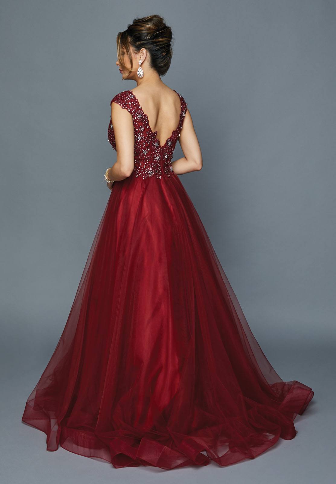 Burgundy long formal dress from back with open back and beaded applique bodice