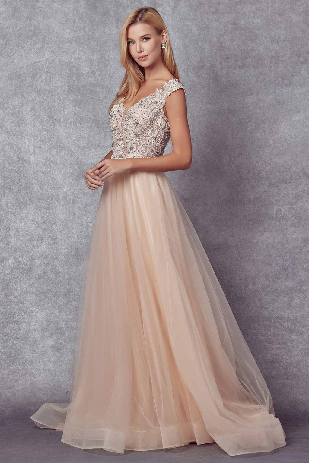 Champagne long formal dress with cap sleeves, embellished bodice, and flowing tulle skirt
