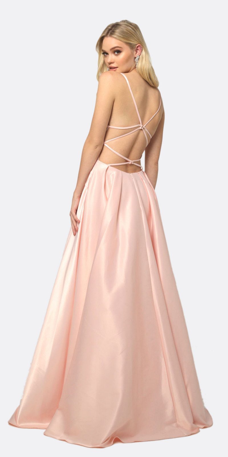 Blush shiny satin prom gown with crisscross back straps and flowing A-line skirt