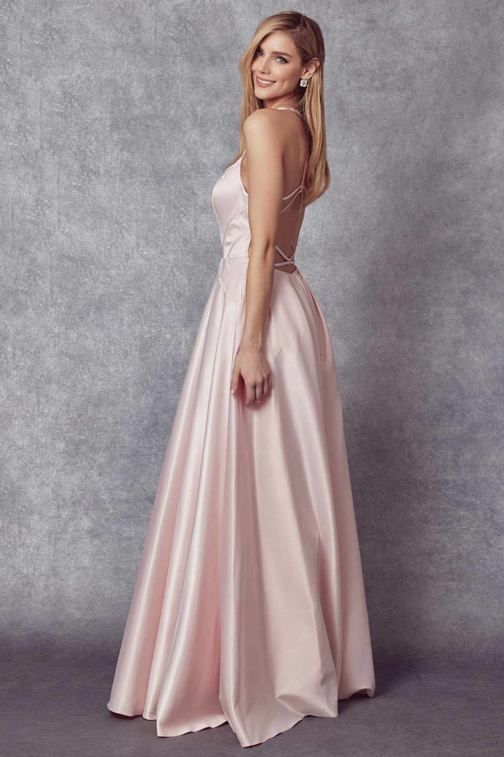 Blush shiny satin A-line prom gown with spaghetti straps and flared full skirt