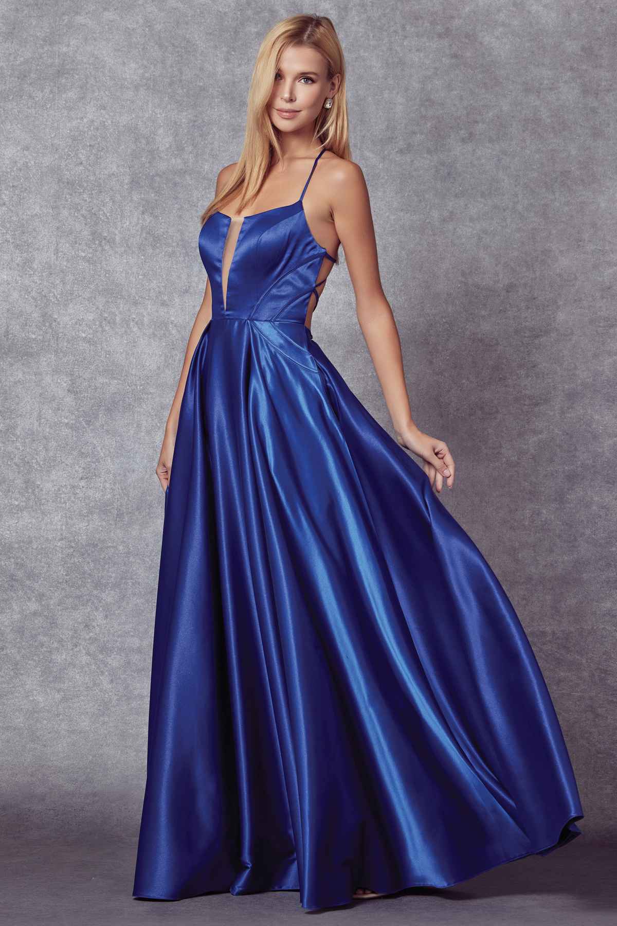 Blue shiny satin A-line prom gown with side crisscross straps and full skirt