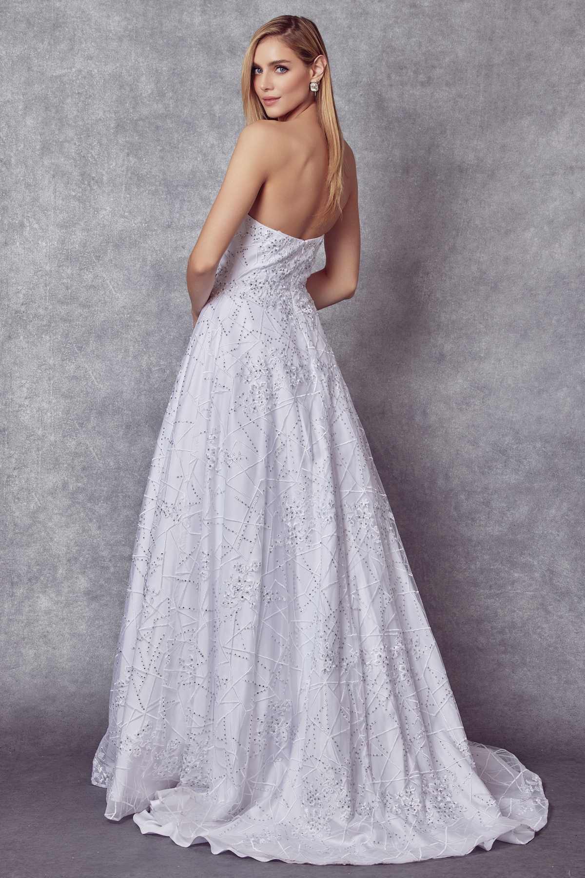 White strapless lace ball gown with fitted bodice and full flowing skirt
