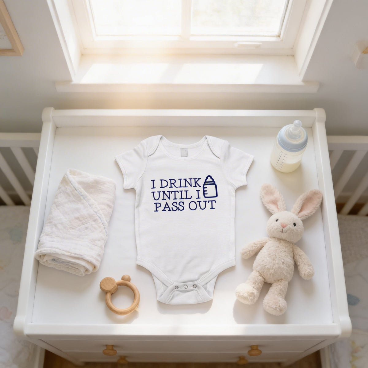 Newborn white short-sleeve bodysuit with blue 'I drink until it pass out' text