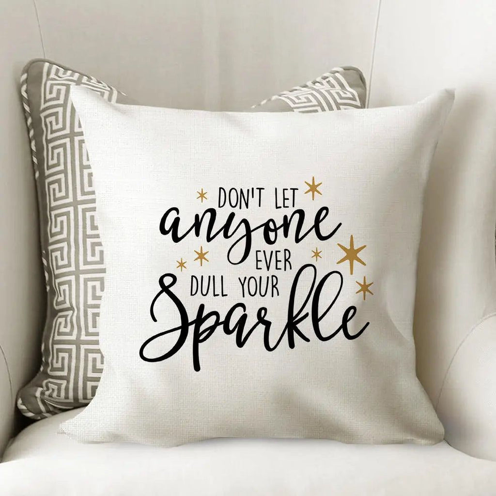 White throw pillow cover with black & gold 'Don't let anyone sparkle' quote