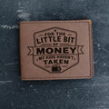 Slim brown leather bifold wallet with engraved front badge and stitched edges