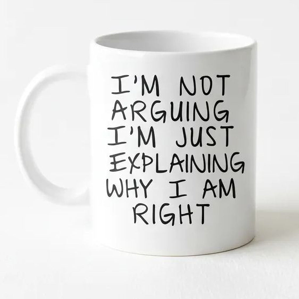 White ceramic coffee mug with black “I’m not arguing…” text
