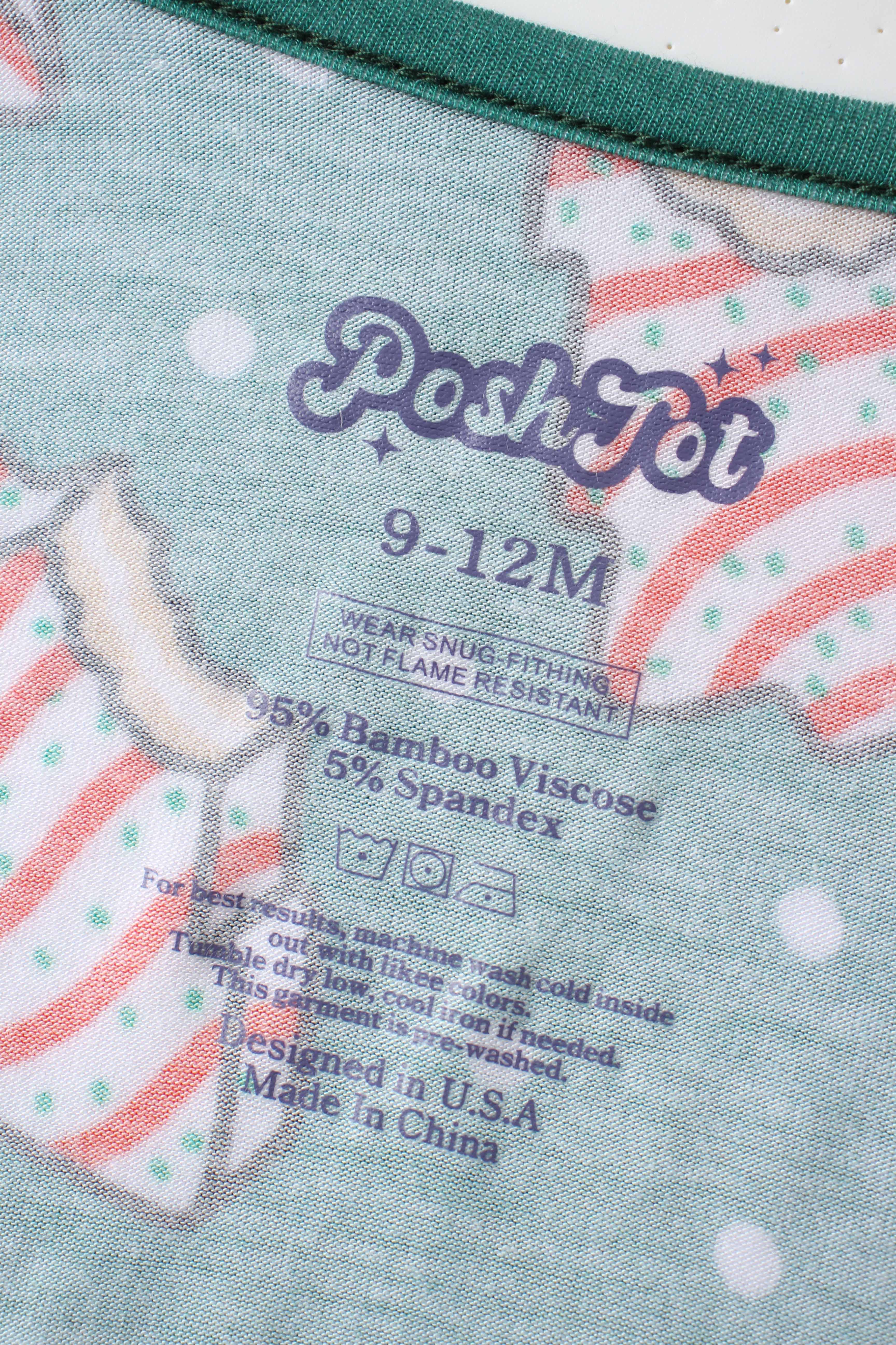 Inside tag: PoshTOT 9–12M bamboo viscose blend on green romper
