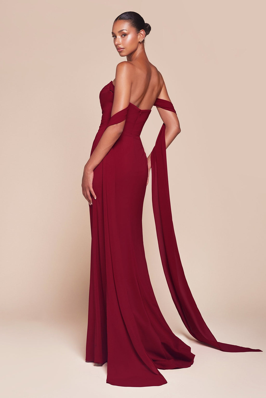 Burgundy off-shoulder chiffon gown with draped bodice and long flowing skirt
