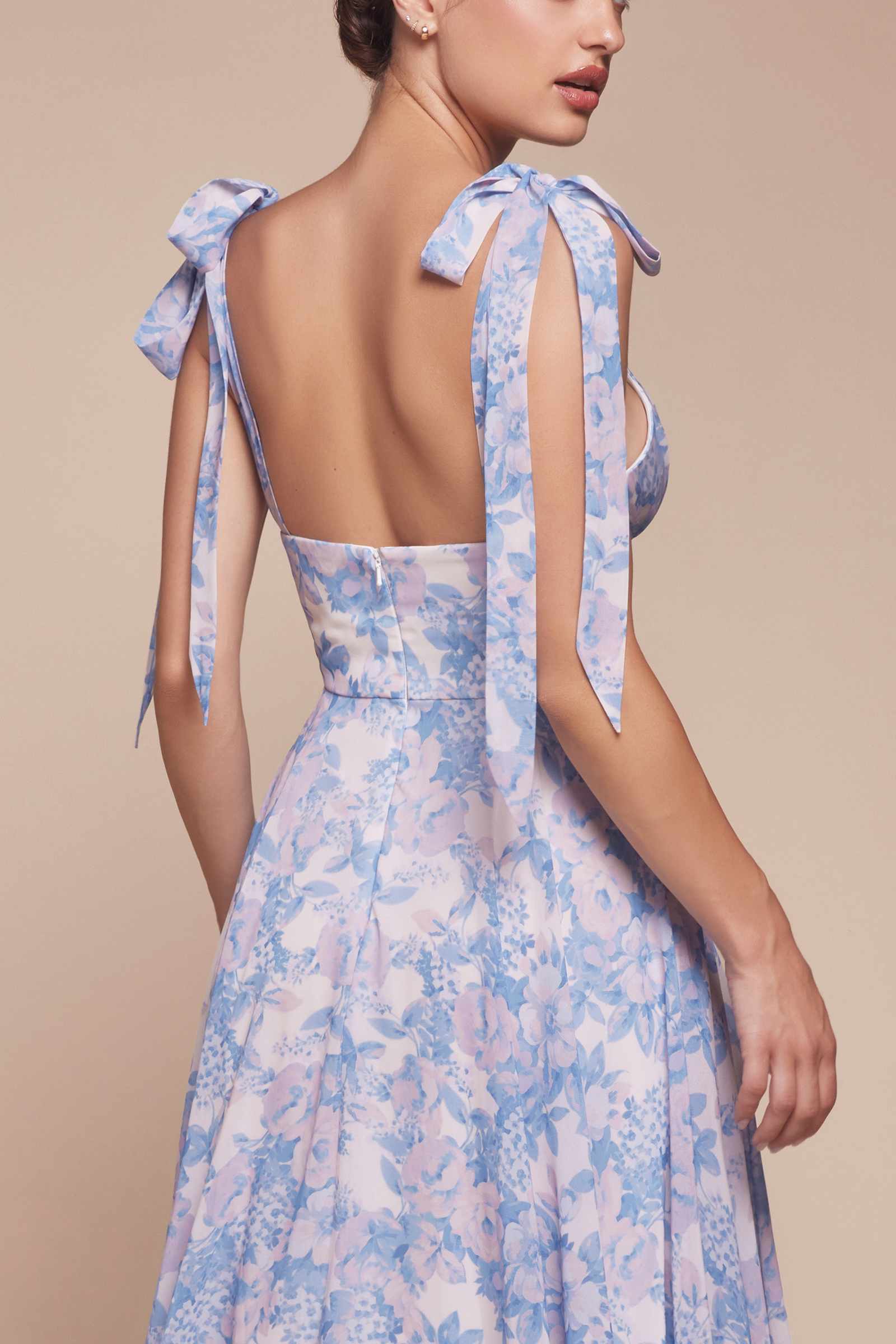 Light blue floral A-line dress with tie-back straps and open back bodice