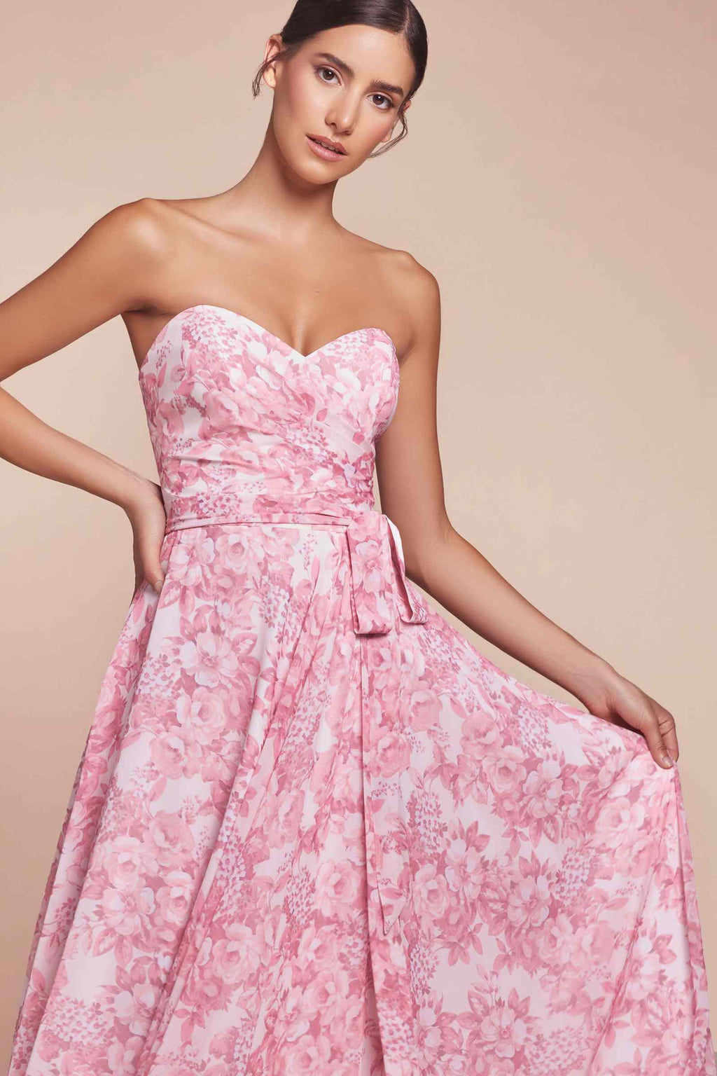 Pink strapless satin A-line dress with floral print and ruched waist bow